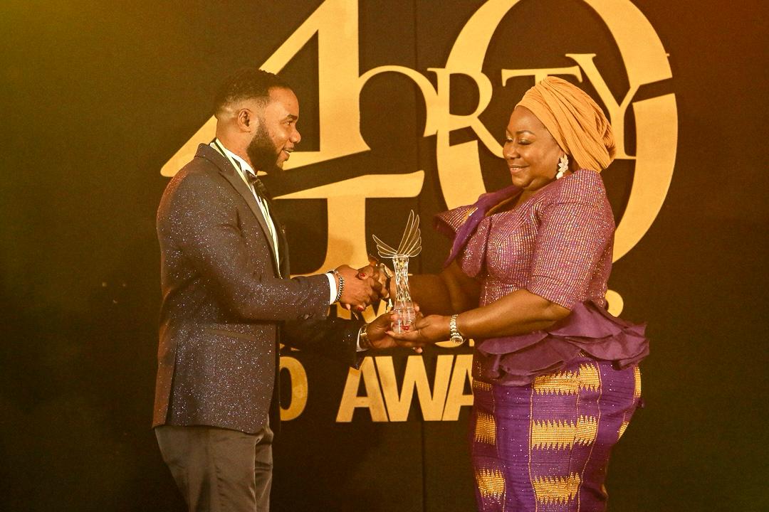 Davida CEO receiving and award